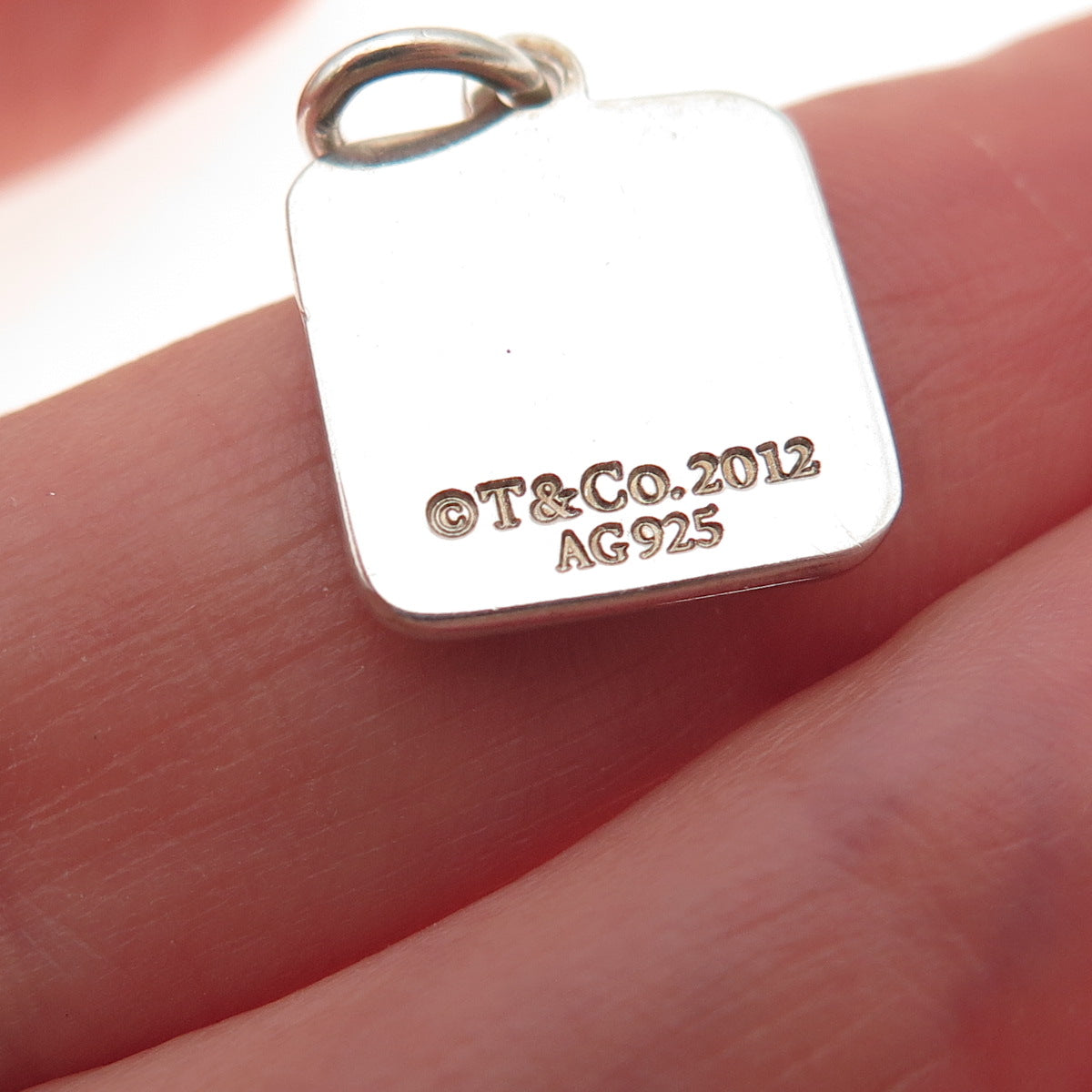 Tiffany & Co. 925 Sterling Silver 2012 Lexicon Bag Charm Pendant