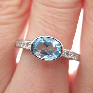 DSMK Sterling Silver Real Oval-Cut Blue & Round-Cut White Topaz Ring Size 8.25