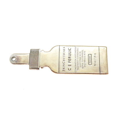 925 Sterling Silver Gold Plated Vintage SkinCeuticals C E Ferulic Tag Pendant