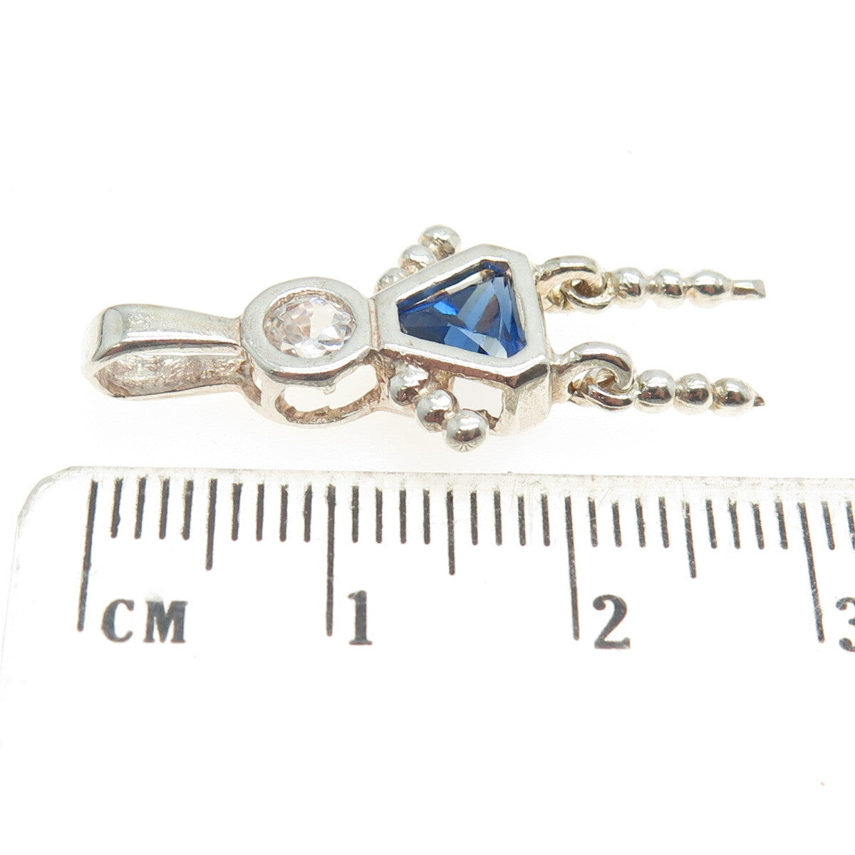 925 Sterling Silver White & Blue C Z Articulated Girl Pendant