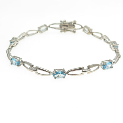 MICHELLE ALBALA 925 Sterling Blue Topaz Horseshoe Tennis Link Bracelet 7.25"