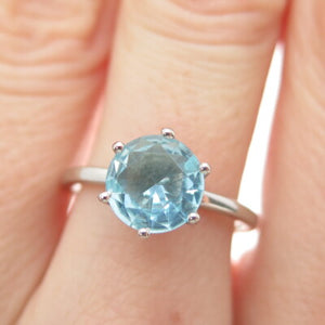 DAZZLERS 925 Sterling Silver Round-Cut Nano Blue Topaz Ring Size 7