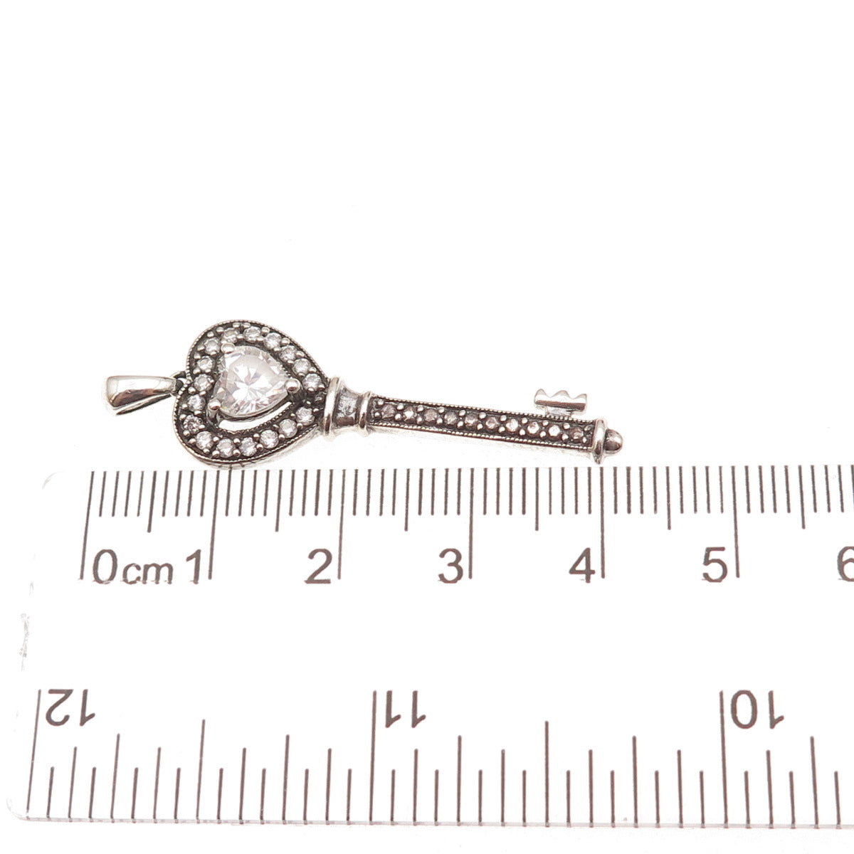 JH Young 925 Sterling Silver Heart & Round-Cut C Z Key Charm Pendant