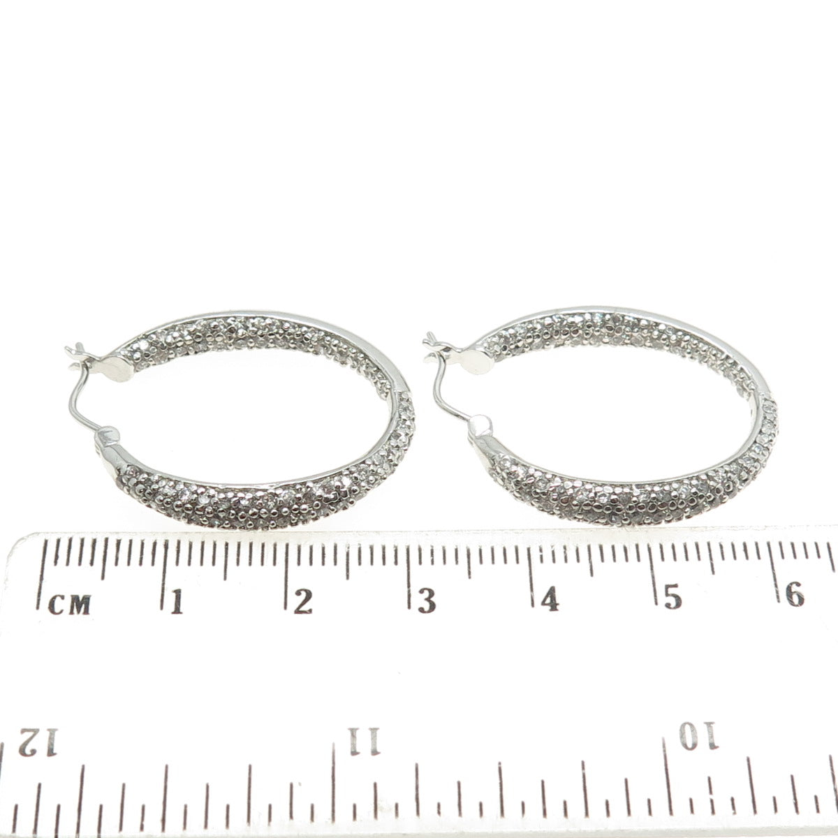 925 Sterling Silver Round-Cut C Z In & Out Oval Hoop Earrings