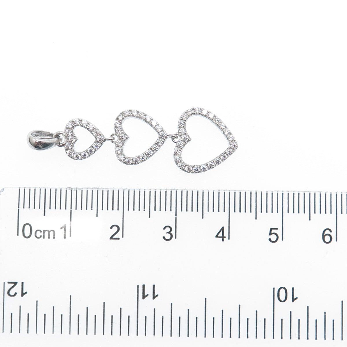 925 Sterling Silver Round-Cut C Z Graduated Heart Pendant