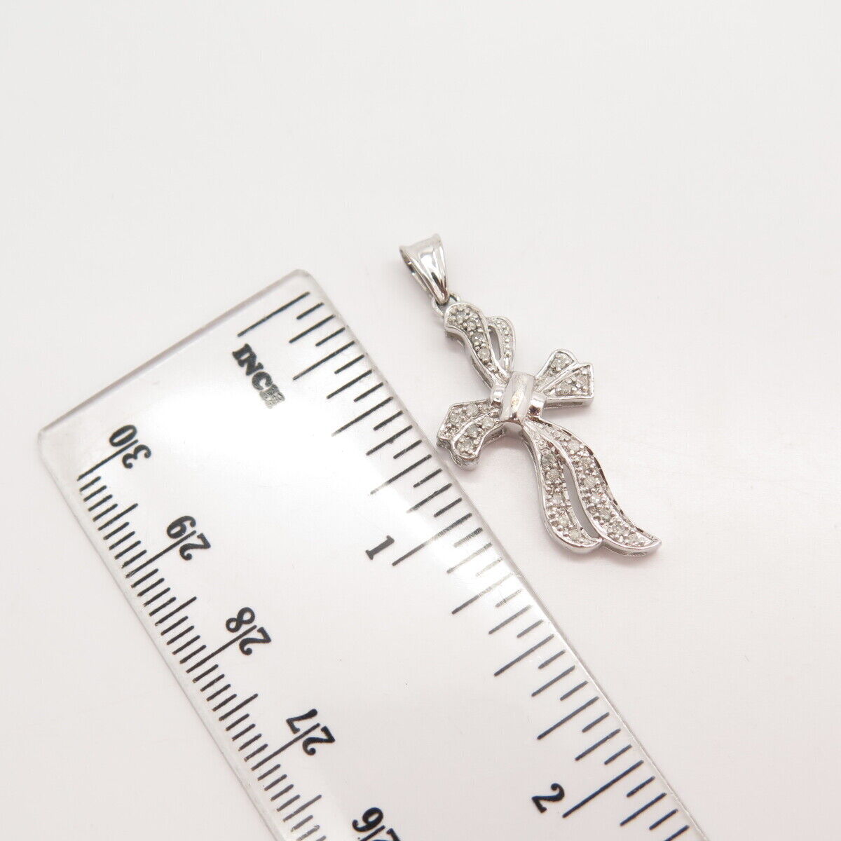 925 Sterling Silver Real Diamond Bow Pendant