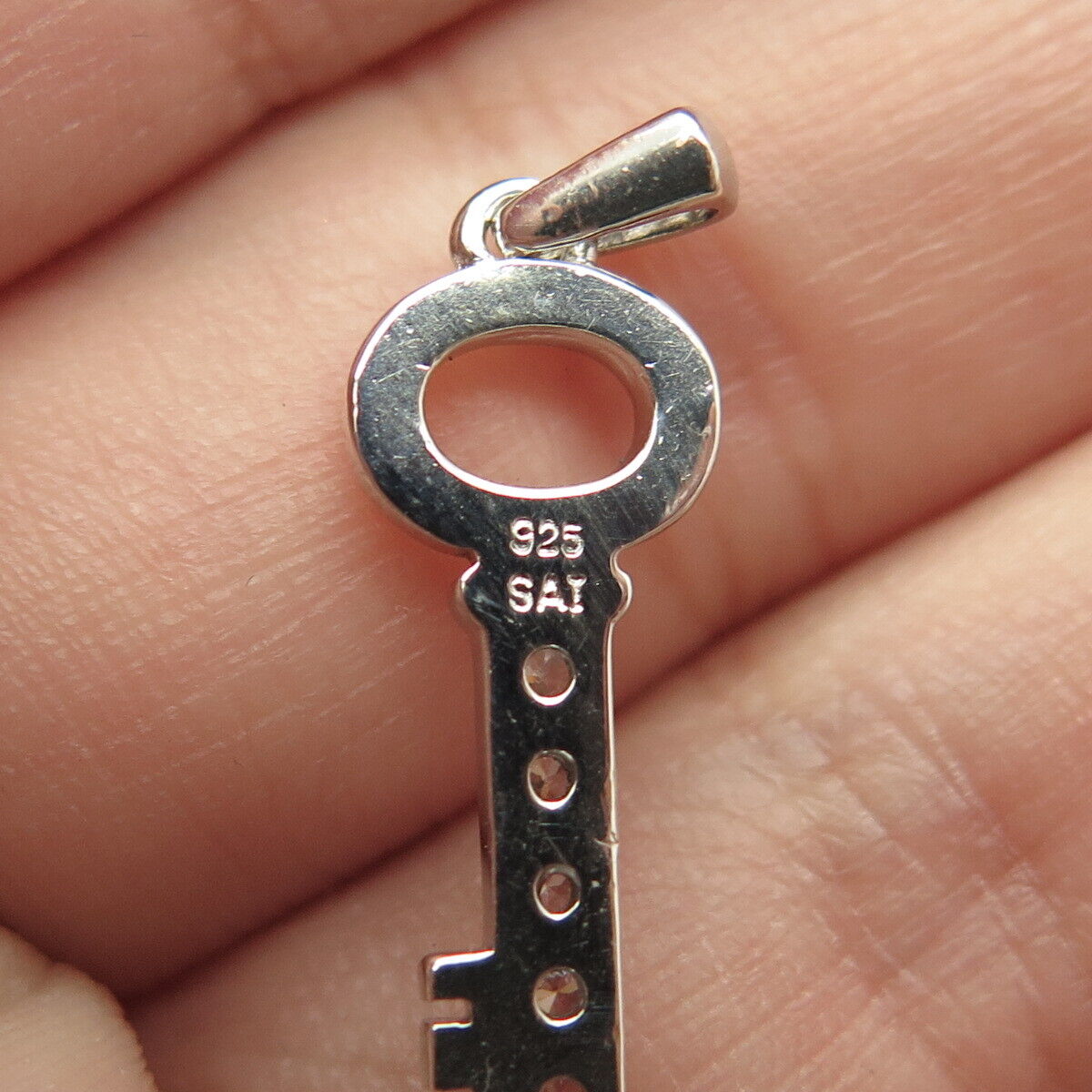 925 Sterling Silver SAI C Z Key Pendant