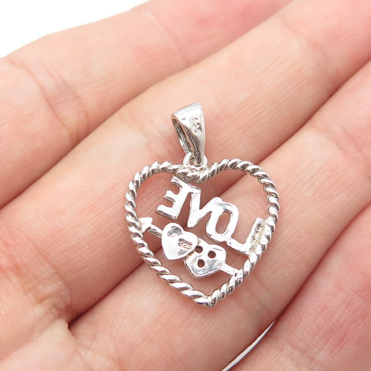 925 Sterling Silver White C Z Love Arrow Roped Heart Open Pendant