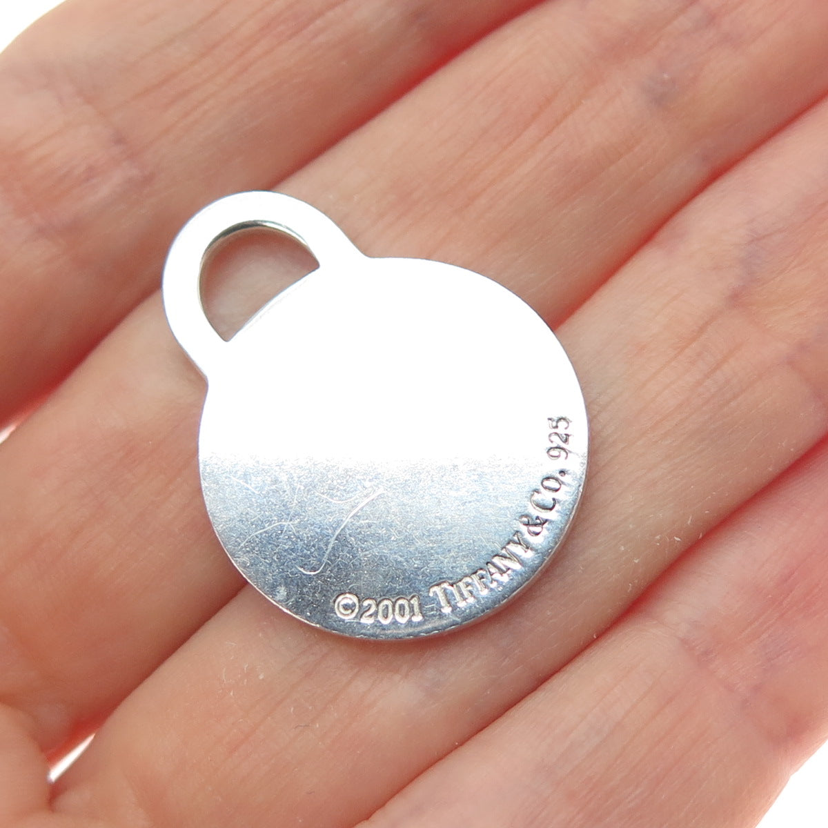 TIFFANY & CO. 925 Sterling Silver Vintage 2001 Engraved Round Tag Charm Pendant
