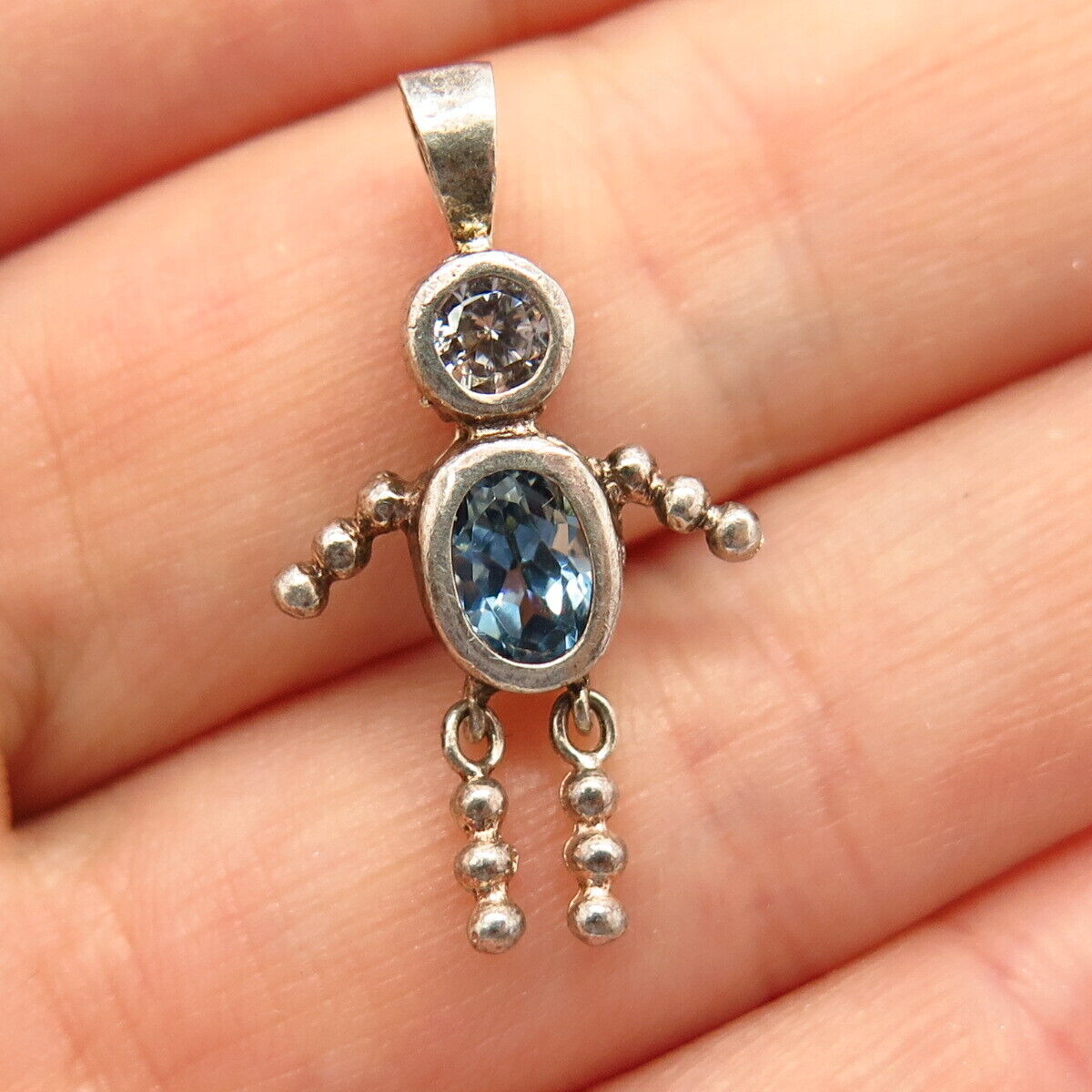 925 Sterling Silver White &  Blue Topaz-Tone C Z Articulated Man Slide Pendant