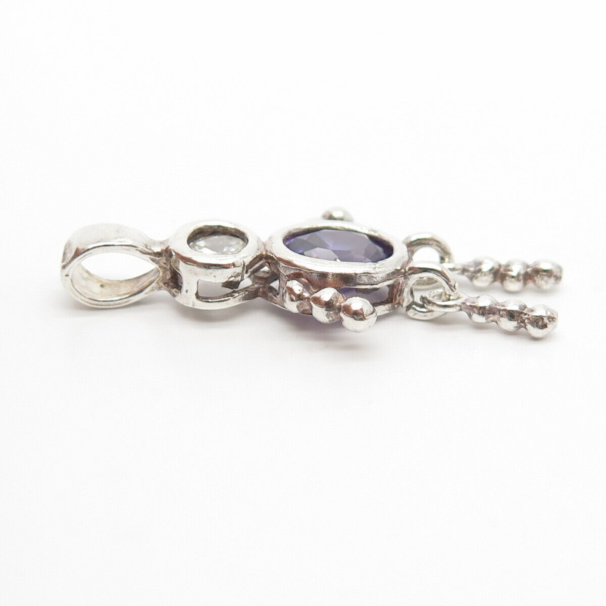 925 Sterling Silver Amethyst-Tone C Z Articulated Human Pendant