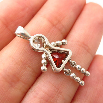 925 Sterling Silver White & Garnet-Tone C Z Articulated Girl Pendant