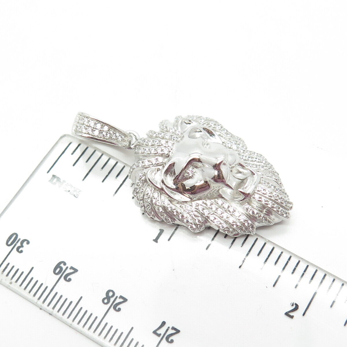 925 Sterling Silver Sara White C Z Royal Lion Pendant