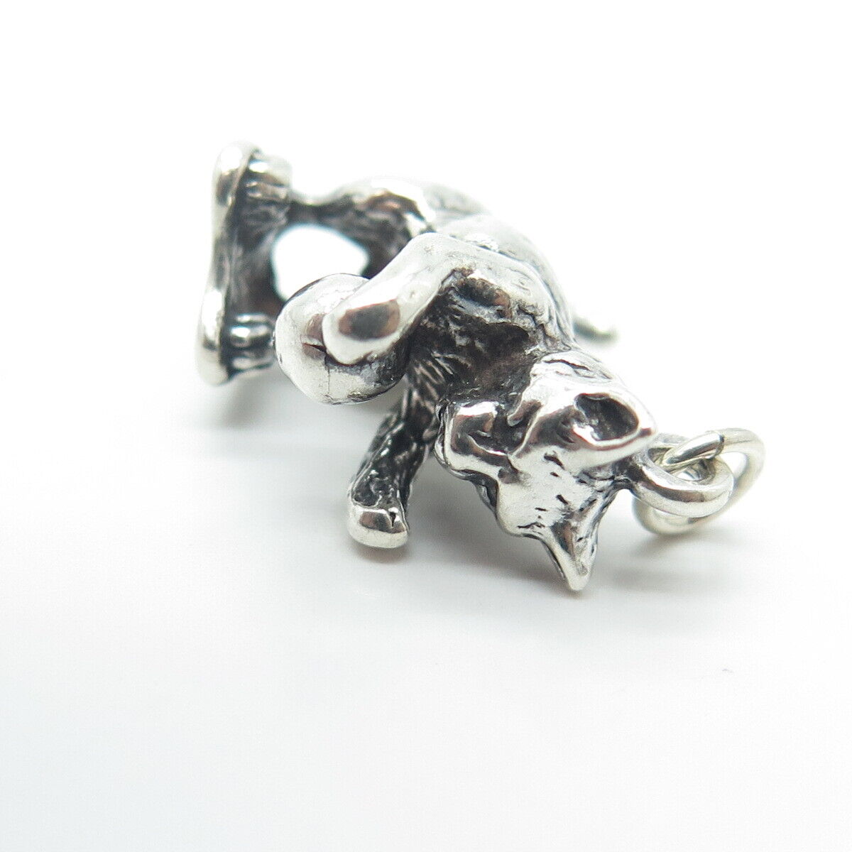 SUNWEST SILVER CO. Sterling Silver Vintage Southwestern Playing Dog Pendant