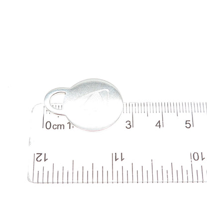 TIFFANY & CO. 925 Sterling Silver Vintage 2001 Engraved Round Tag Charm Pendant