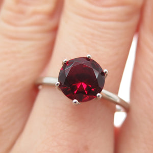 DAZZLERS 925 Sterling Silver Round-Cut Nano Red Garnet Ring Size 8