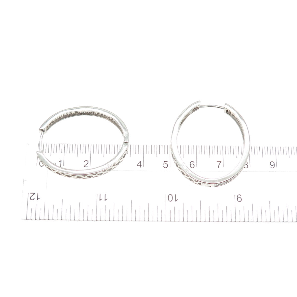 925 Sterling Silver Round-Cut C Z Sparkle Oval Hoop Earrings