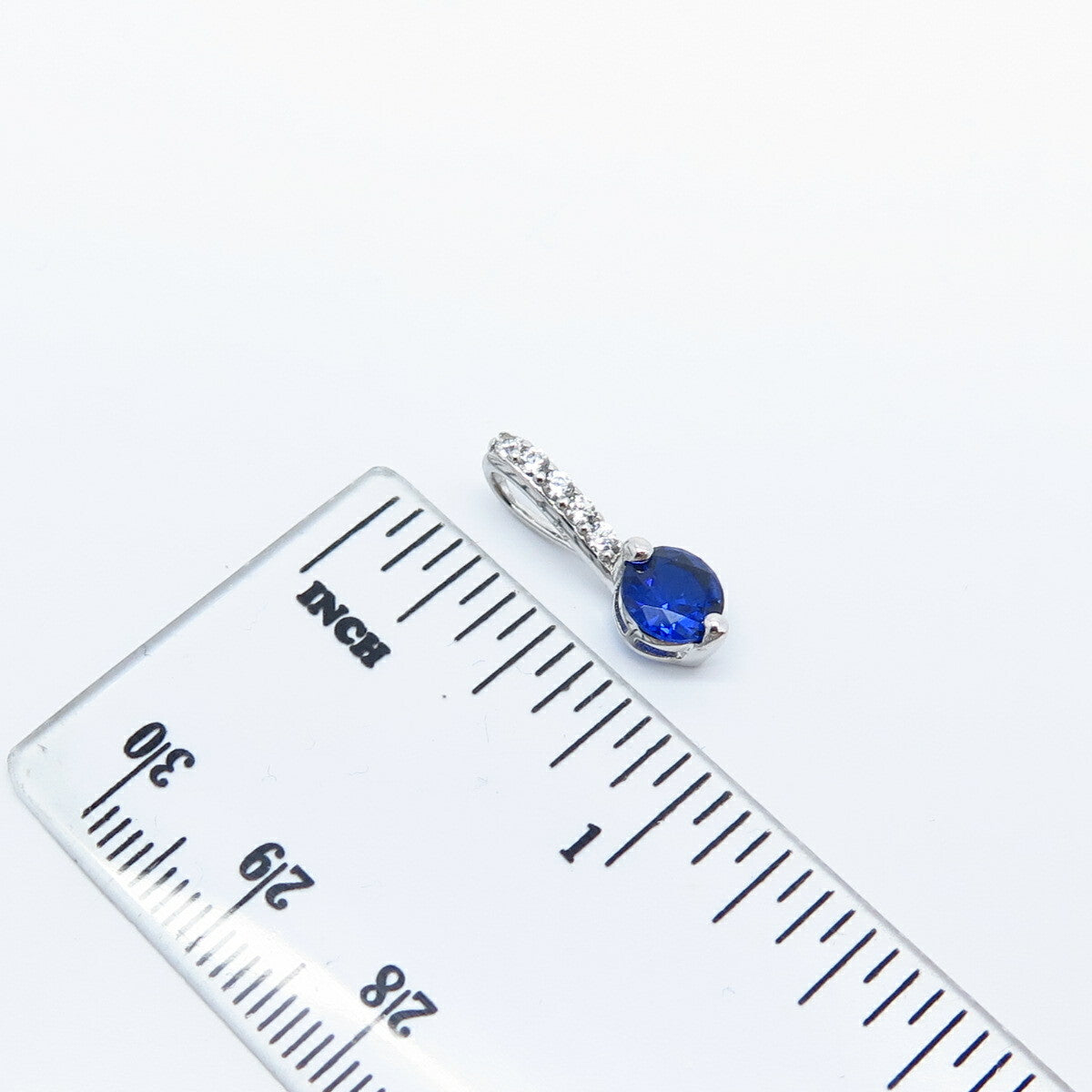 925 Sterling Silver White & Blue C Z Round Slide Pendant