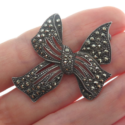 935 Silver Antique RES Germany Marcasite Bow Oxidized Brooch (missing 1 stone)