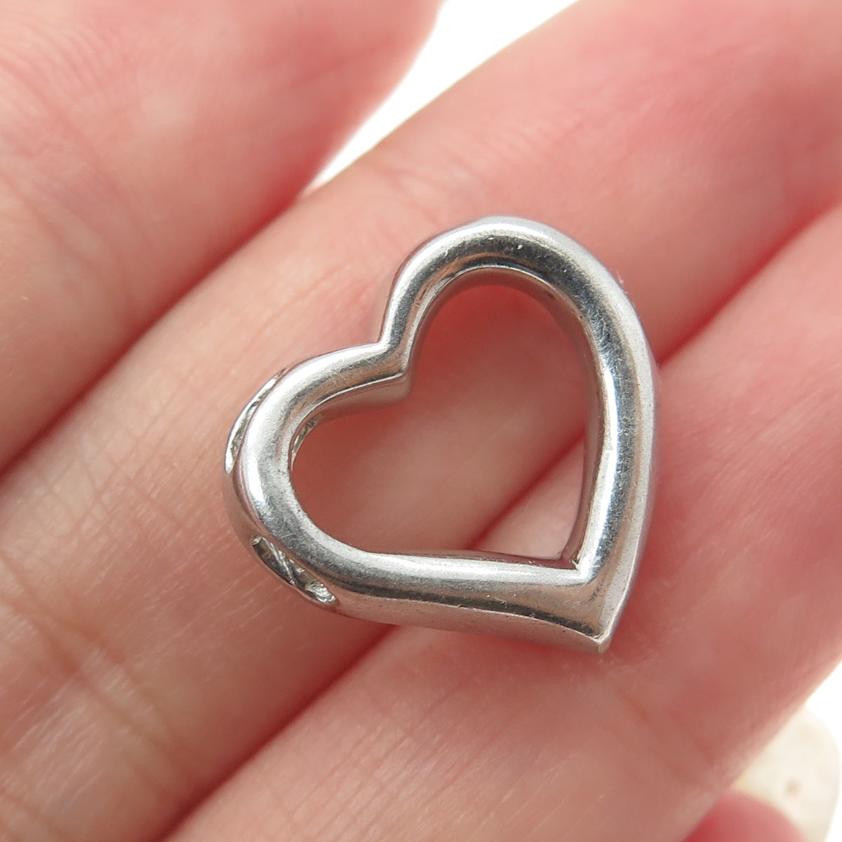 JH YOUNG Sterling Silver Graduated Round-Cut C Z Heart Minimalist Slide Pendant