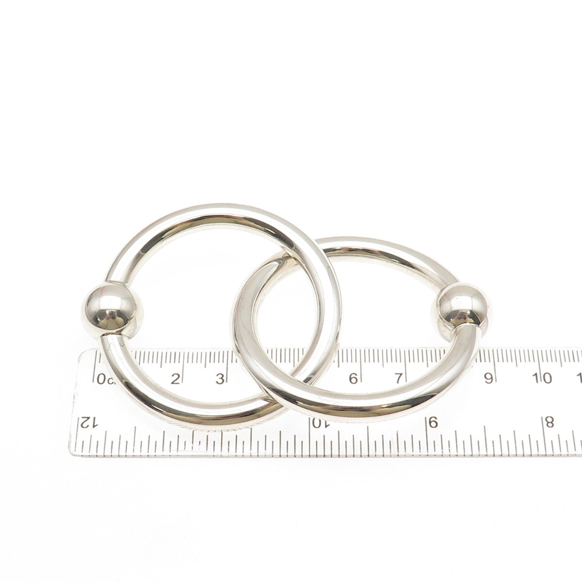 TIFFANY & CO. 925 Sterling Silver Vintage Interlocked Eternity Circle Pin Brooch