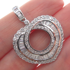 925 Sterling Silver Round & Tapered Baguette C Z Heart Pendant