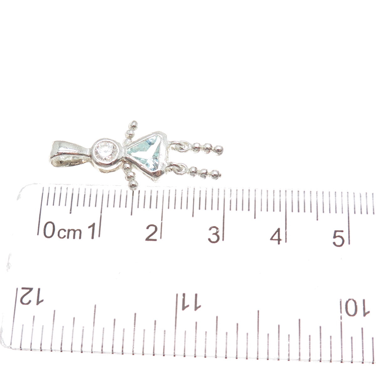 CELLINI Sterling Vintage Blue White CZ March Birthstone Girl Articulated Pendant