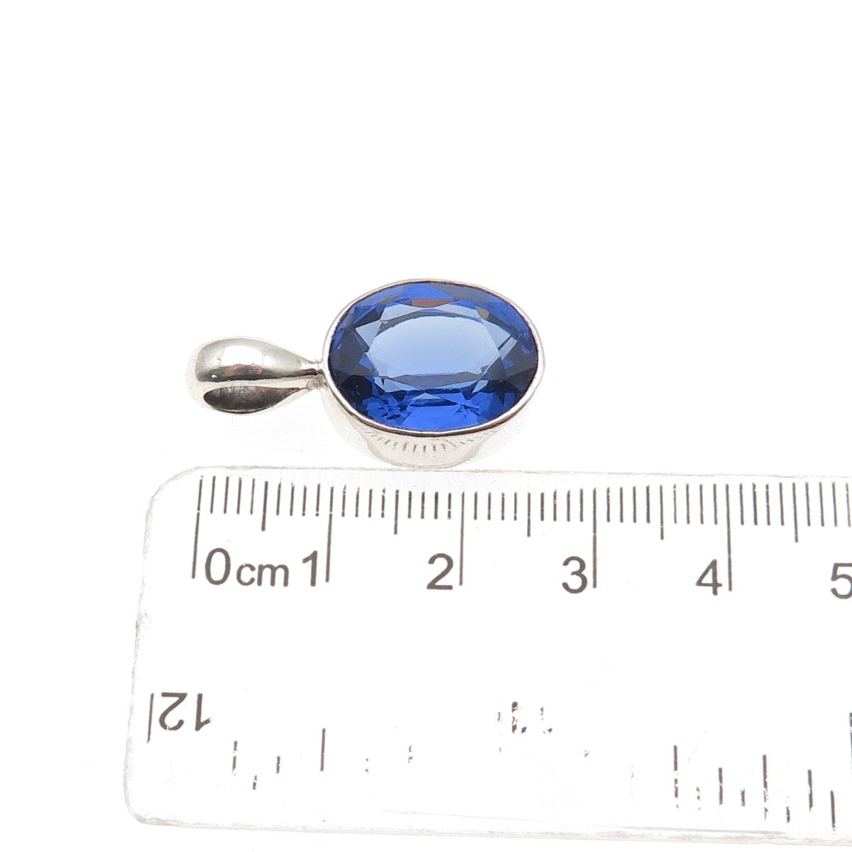 925 Sterling Silver Vintage Oval-Cut Blue C Z Charm Pendant