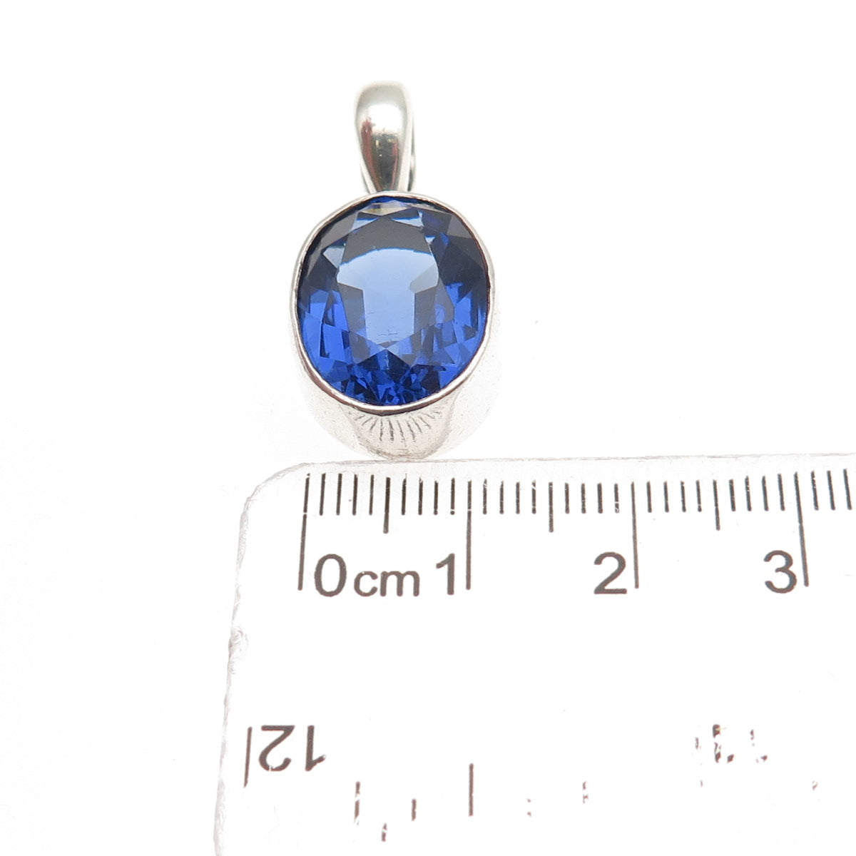 925 Sterling Silver Vintage Oval-Cut Blue C Z Charm Pendant