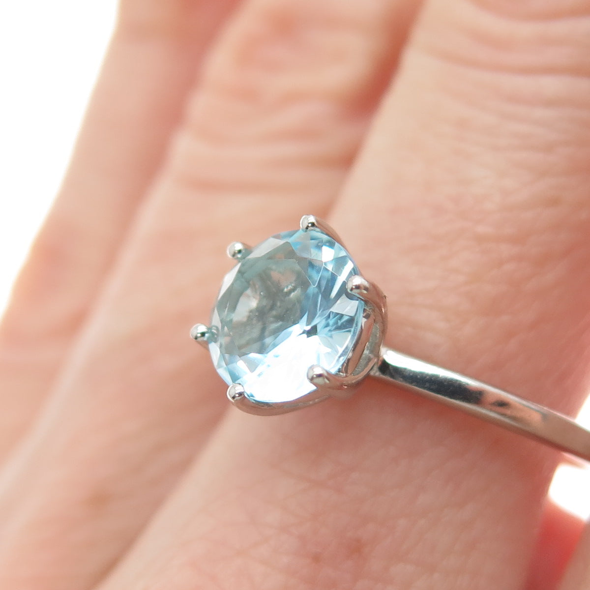 DAZZLERS 925 Sterling Silver Round-Cut Nano Blue Topaz Ring Size 7.75
