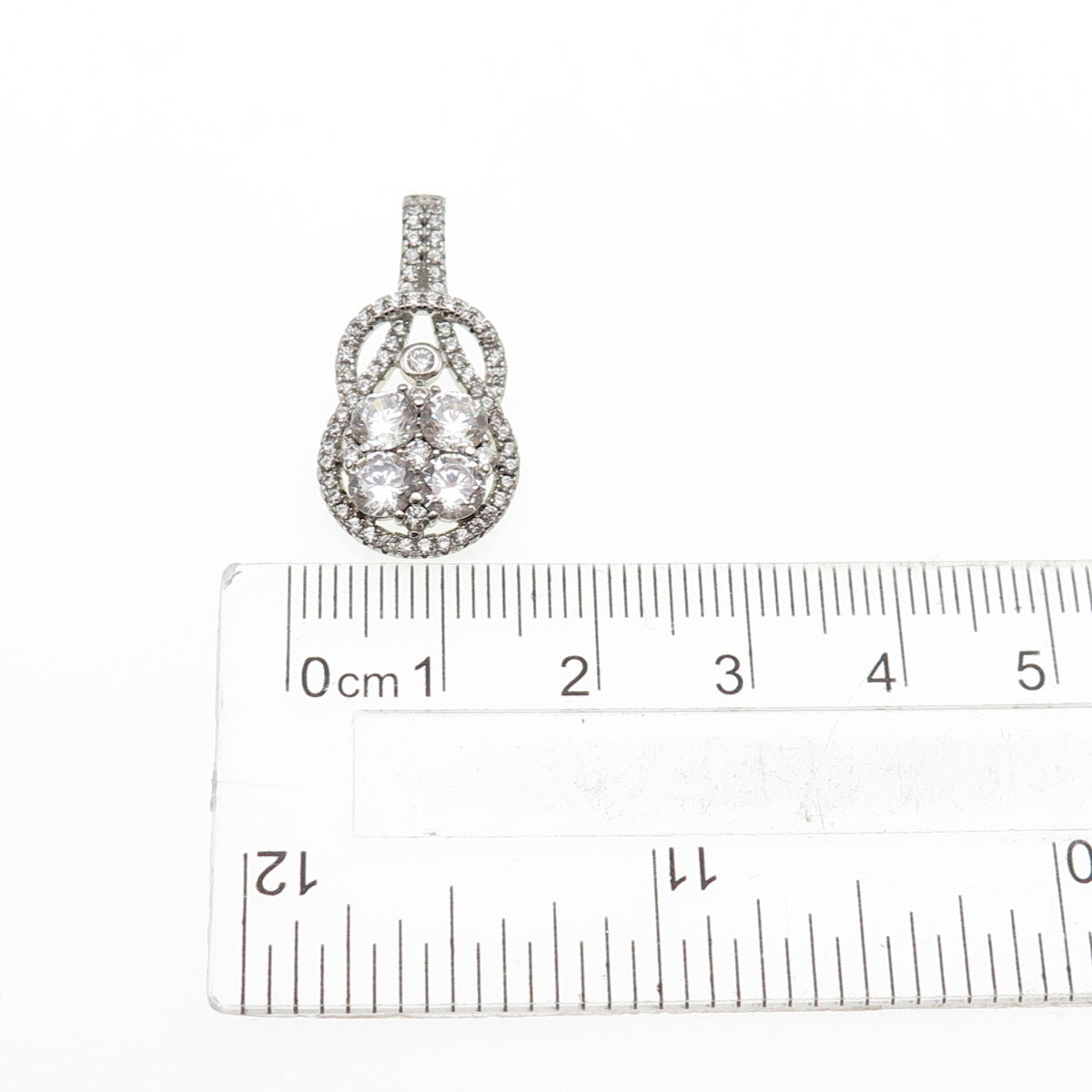 925 Sterling Silver Round-Cut C Z Knot Teardrop Charm Pendant