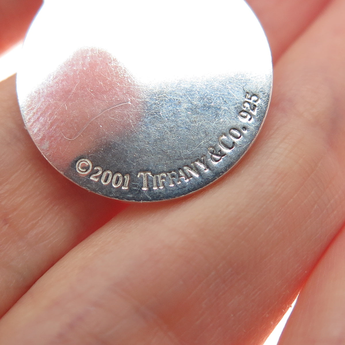 TIFFANY & CO. 925 Sterling Silver Vintage 2001 Engraved Round Tag Charm Pendant
