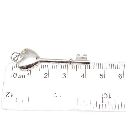 925 Sterling Silver Round-Cut C Z Heart Key Charm Pendant