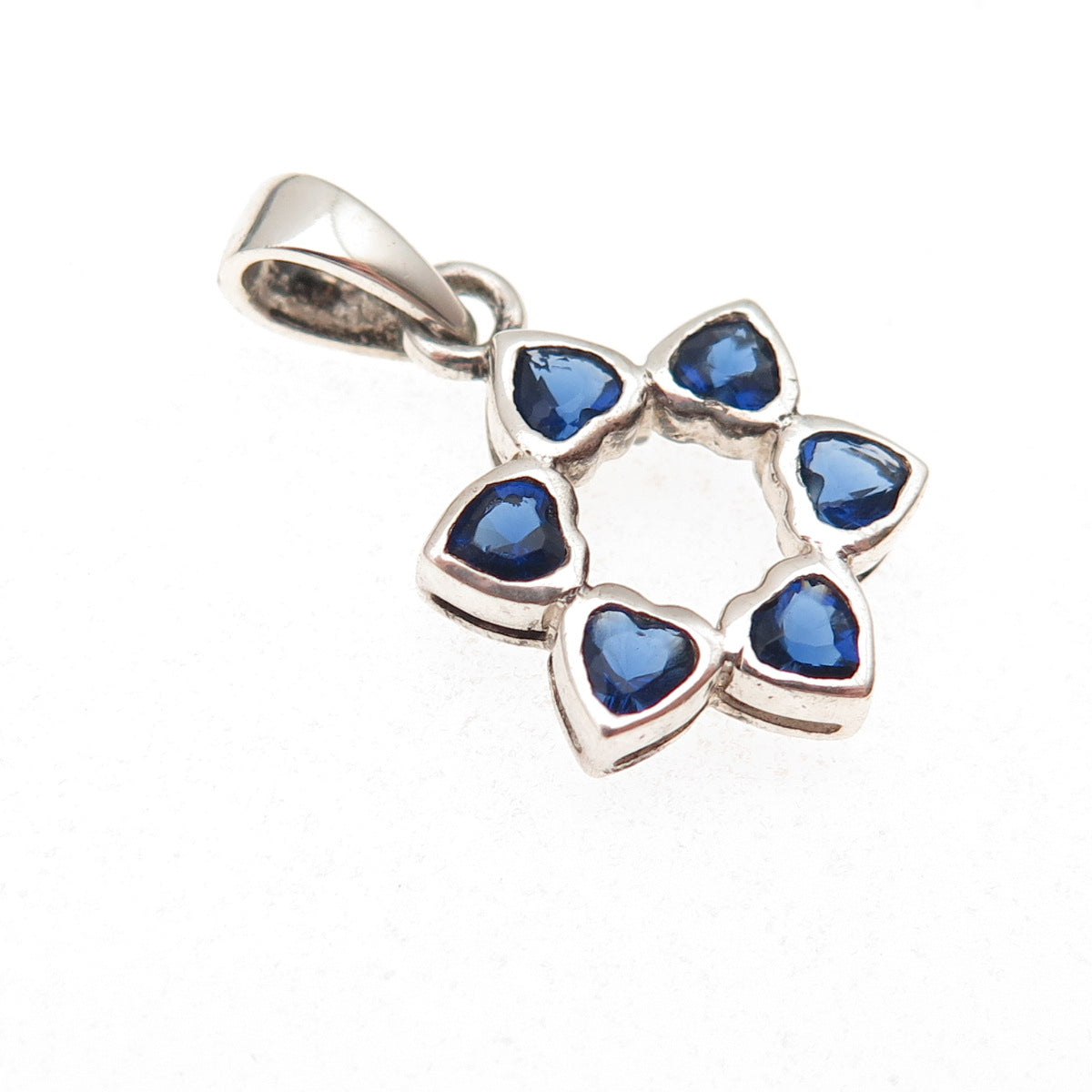 925 Sterling Silver Heart-Cut Blue C Z Floral Charm Pendant