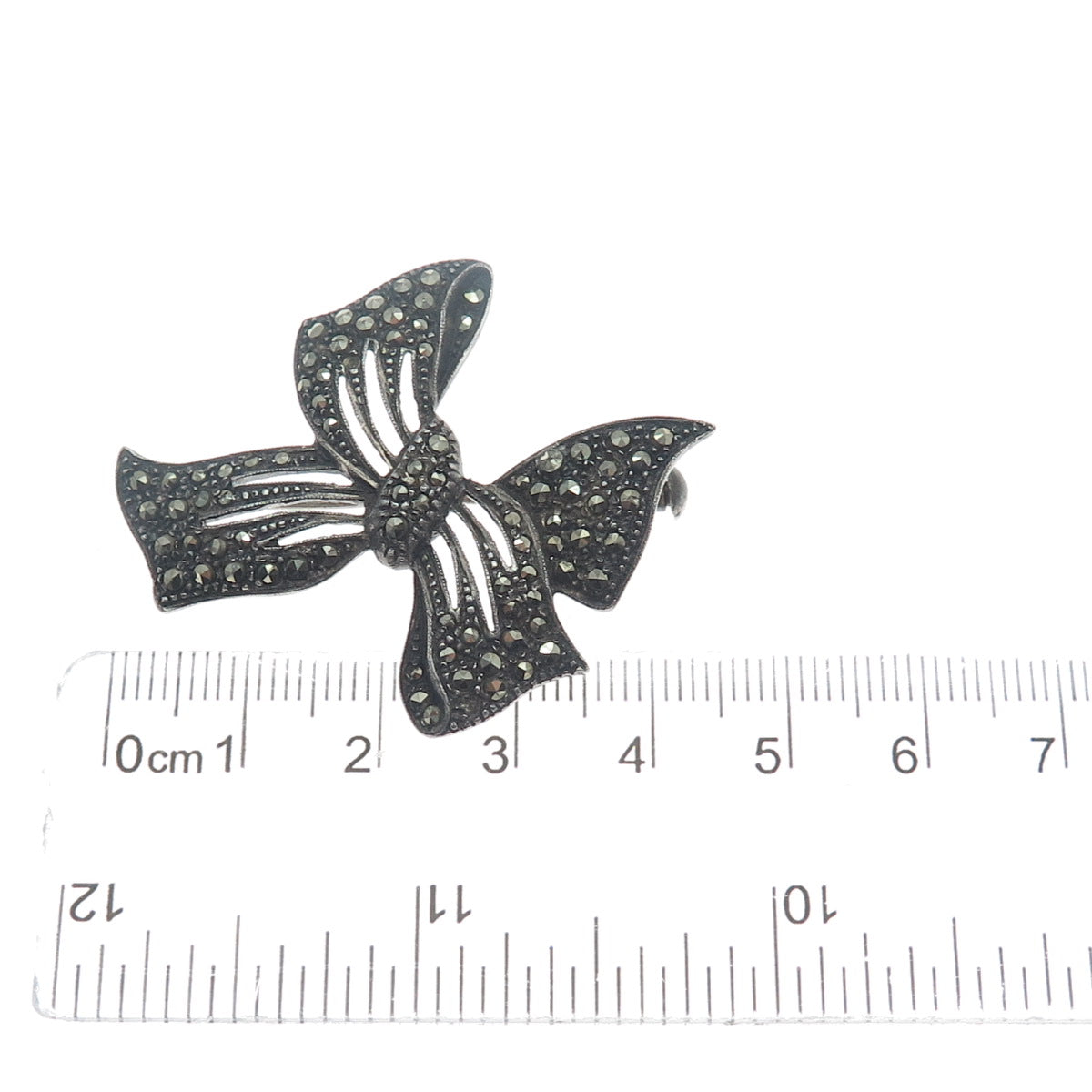 935 Silver Antique RES Germany Marcasite Bow Oxidized Brooch (missing 1 stone)