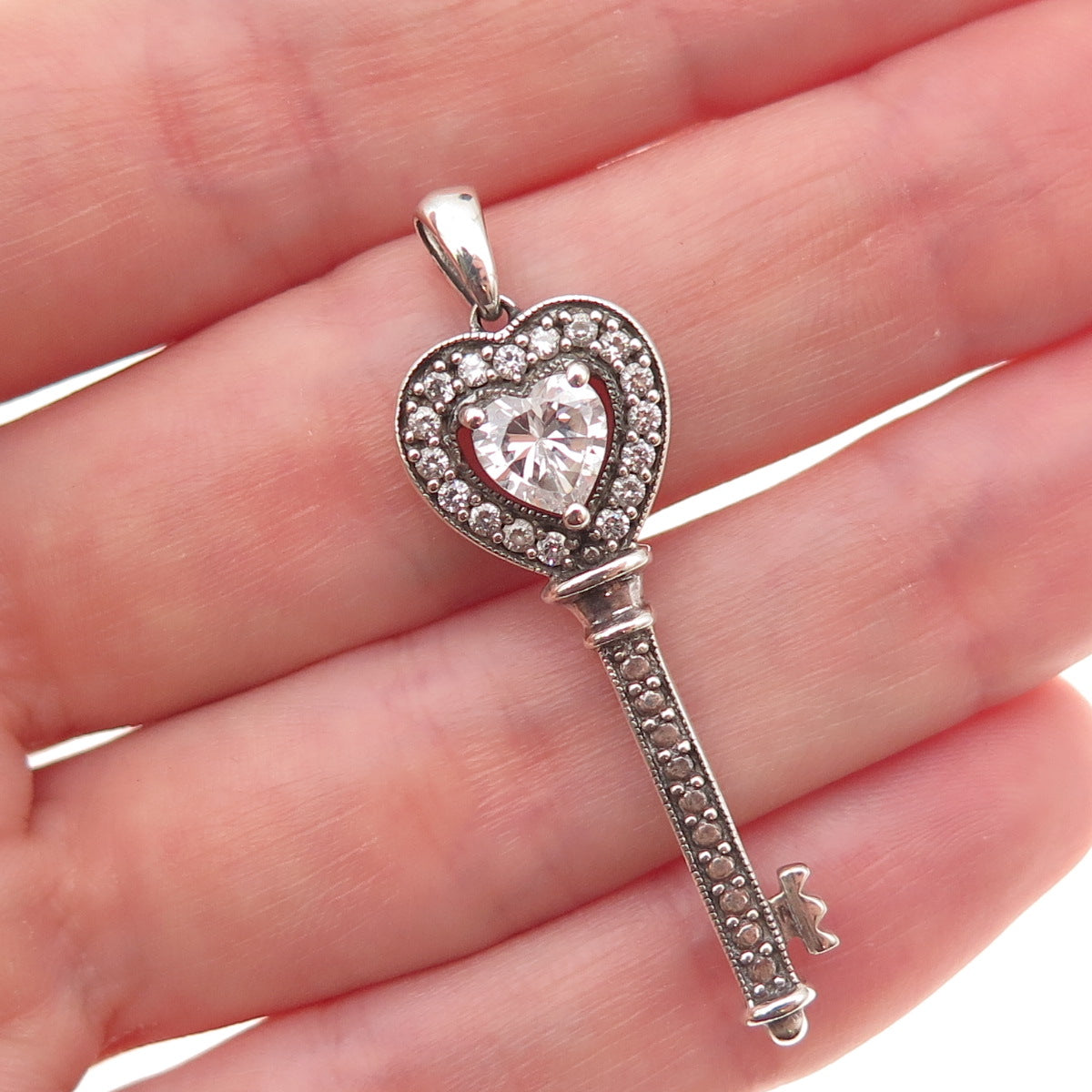 JH Young 925 Sterling Silver Heart & Round-Cut C Z Key Charm Pendant