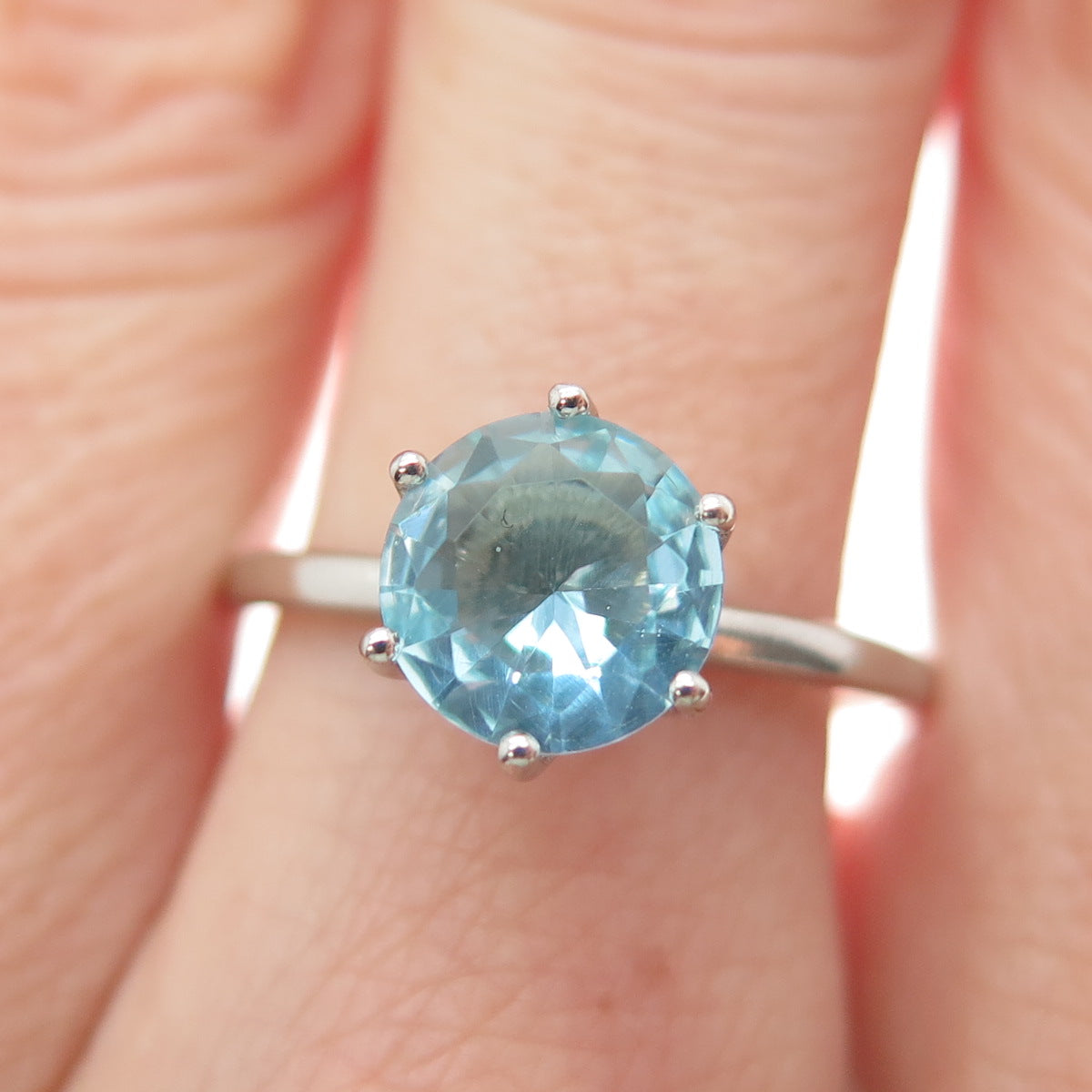 DAZZLERS 925 Sterling Silver Round-Cut Nano Blue Topaz Ring Size 7.75