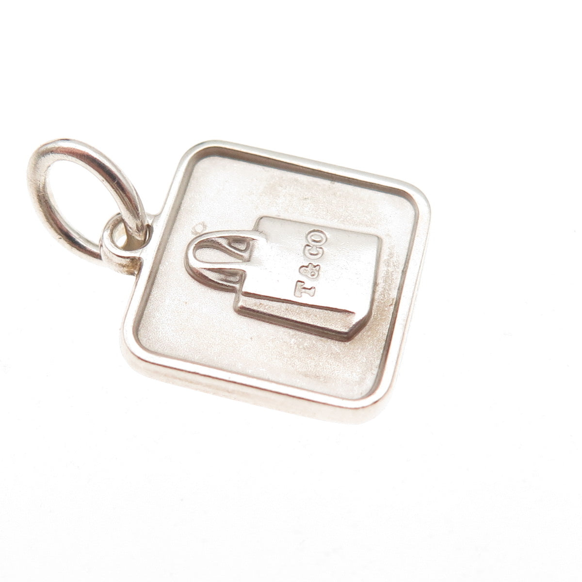 Tiffany & Co. 925 Sterling Silver 2012 Lexicon Bag Charm Pendant