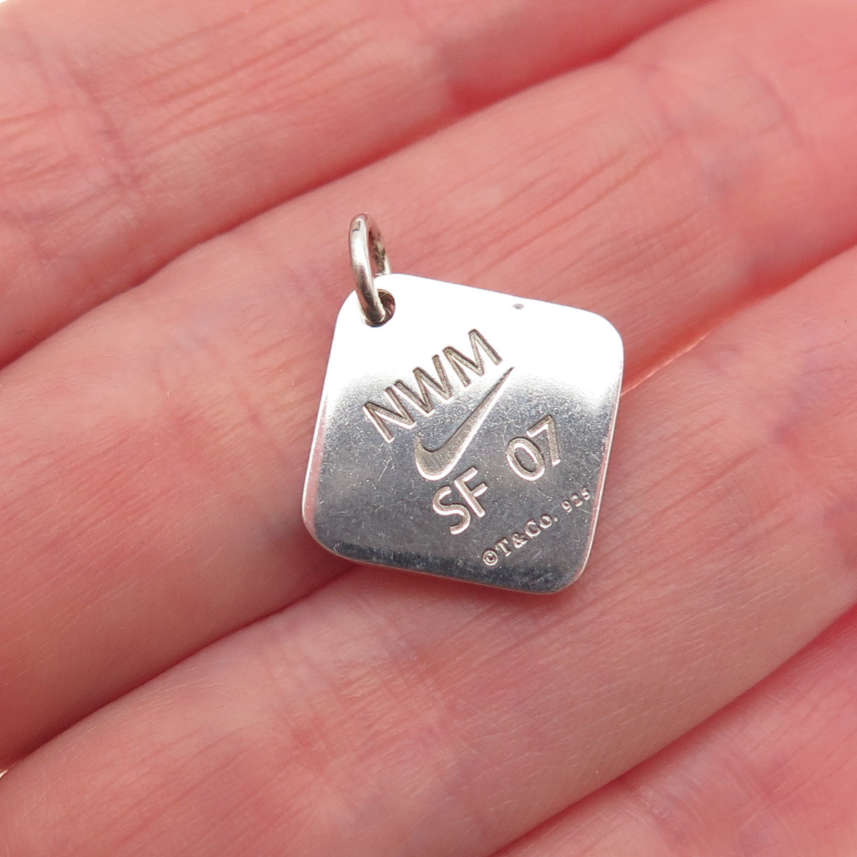 Tiffany & Co. Sterling Silver Vintage Nike Women's Marathon 2007 Mini Pendant